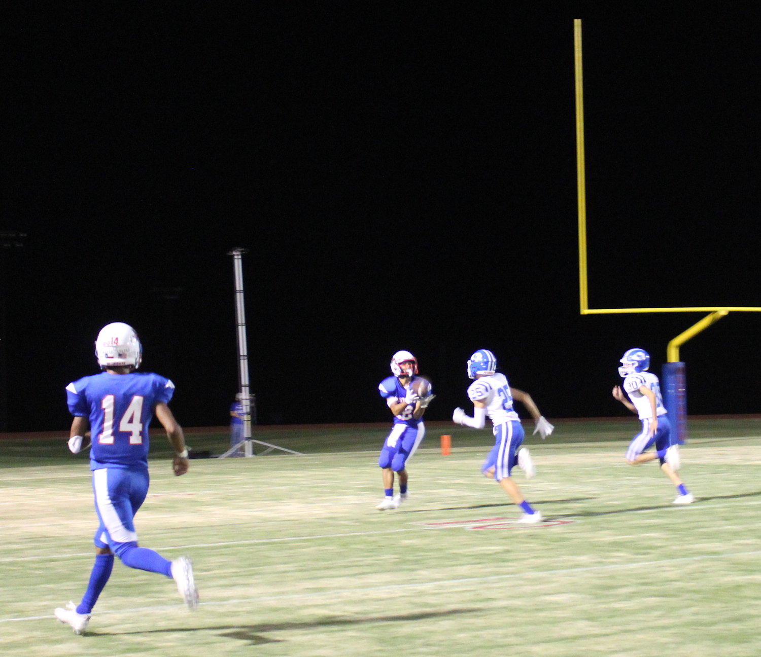 Jeremiah Munoz (12) hauls in a TD pass for Nixon-Smiley against Hallettsville Sacred Heart on Friday, Sept. 10.
