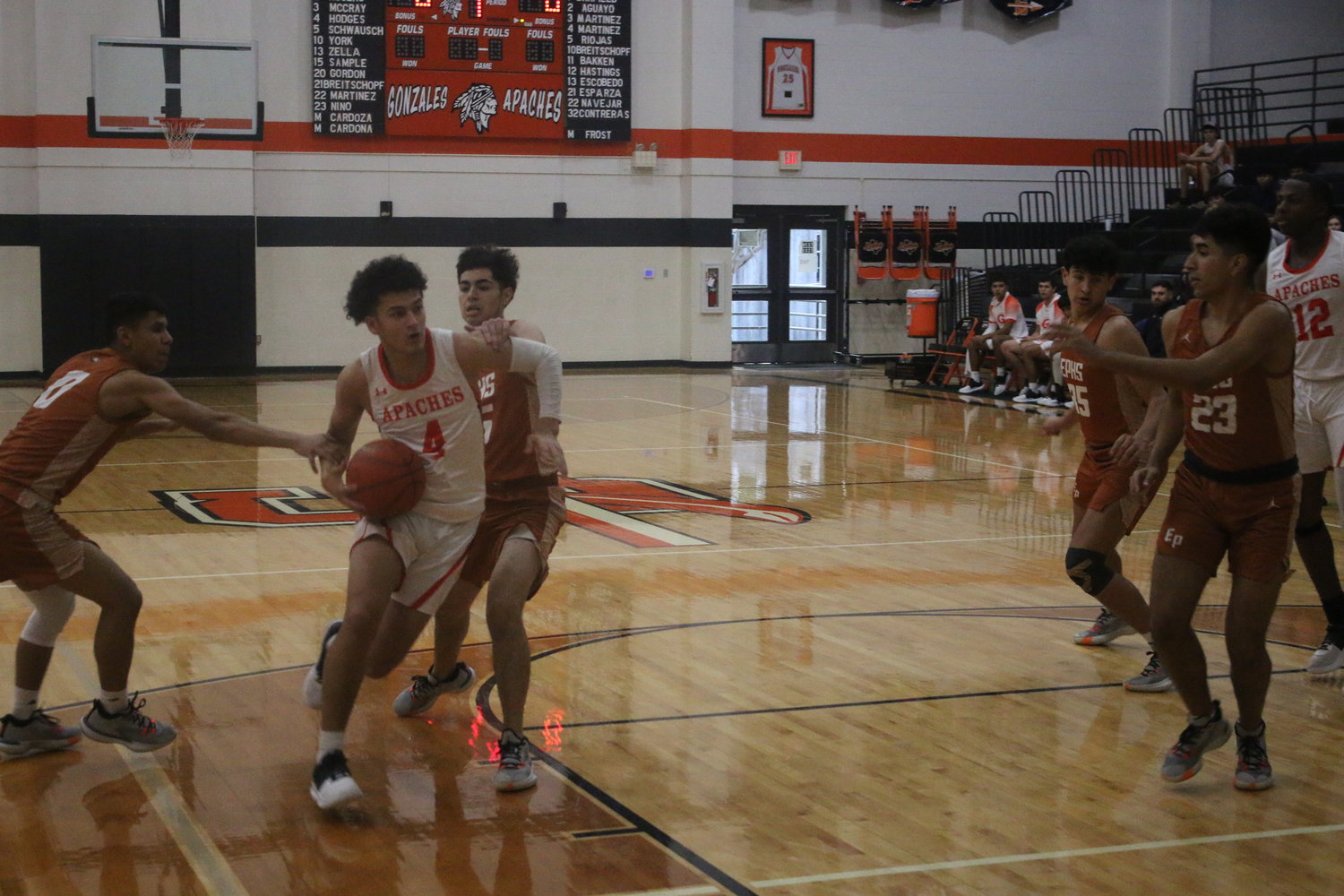 Angel Martinez drives and gets fouled against Eagle Pass. Martinez scored 20 points against Karnes City in a 69-46 win.