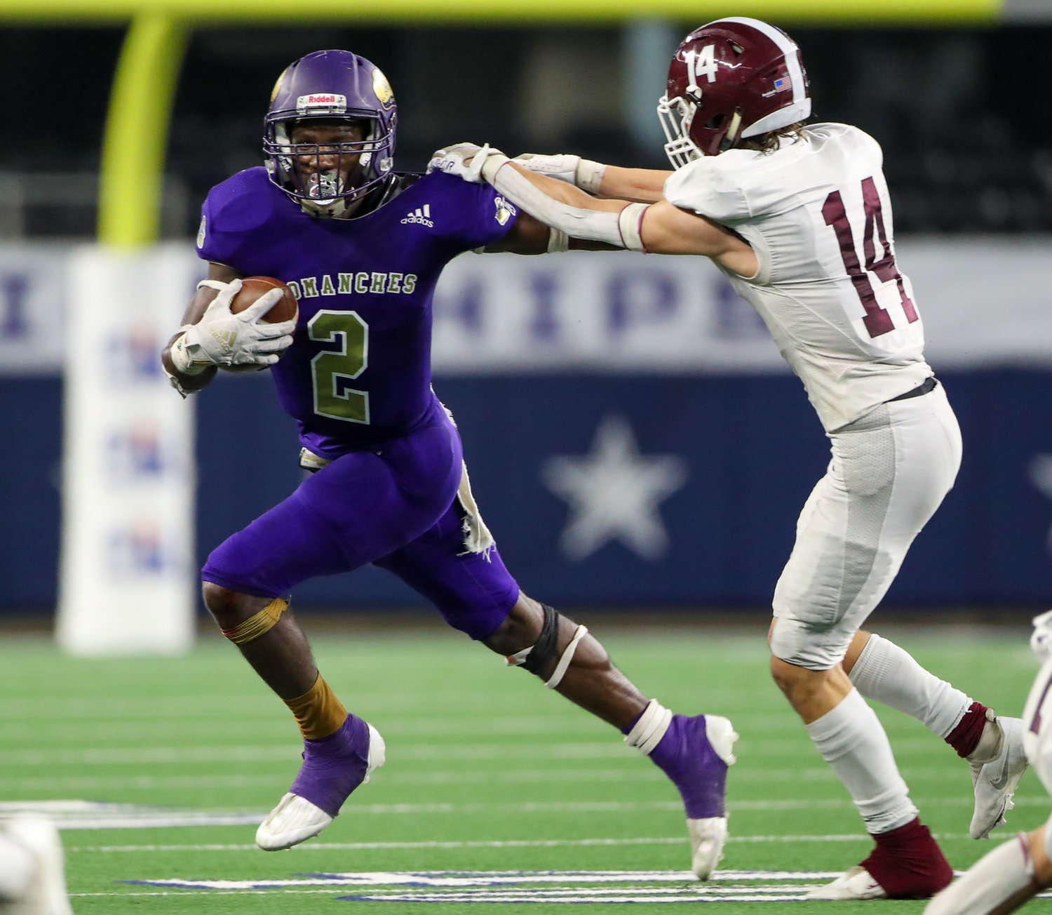 Shiner Comanches junior Dalton Brooks (2) carries the ball during the Class 2A Division I state football championship game between Shiner and Hawley on December 15, 2021 in Arlington, Texas.