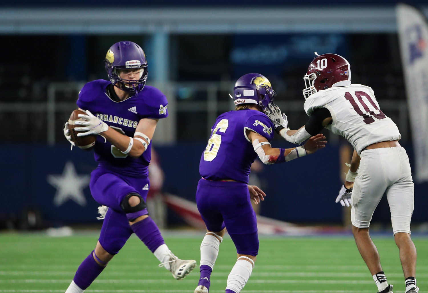 Shiner Comanches senior Eli Fric (8) intercepts a pass during the Class 2A Division I state football championship game between Shiner and Hawley on December 15, 2021 in Arlington, Texas.