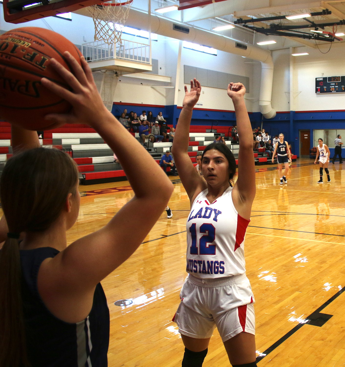Kendall Amaya guards the inbounds pass by a Goliad Lady Tiger in the second period of Tuesday's game.