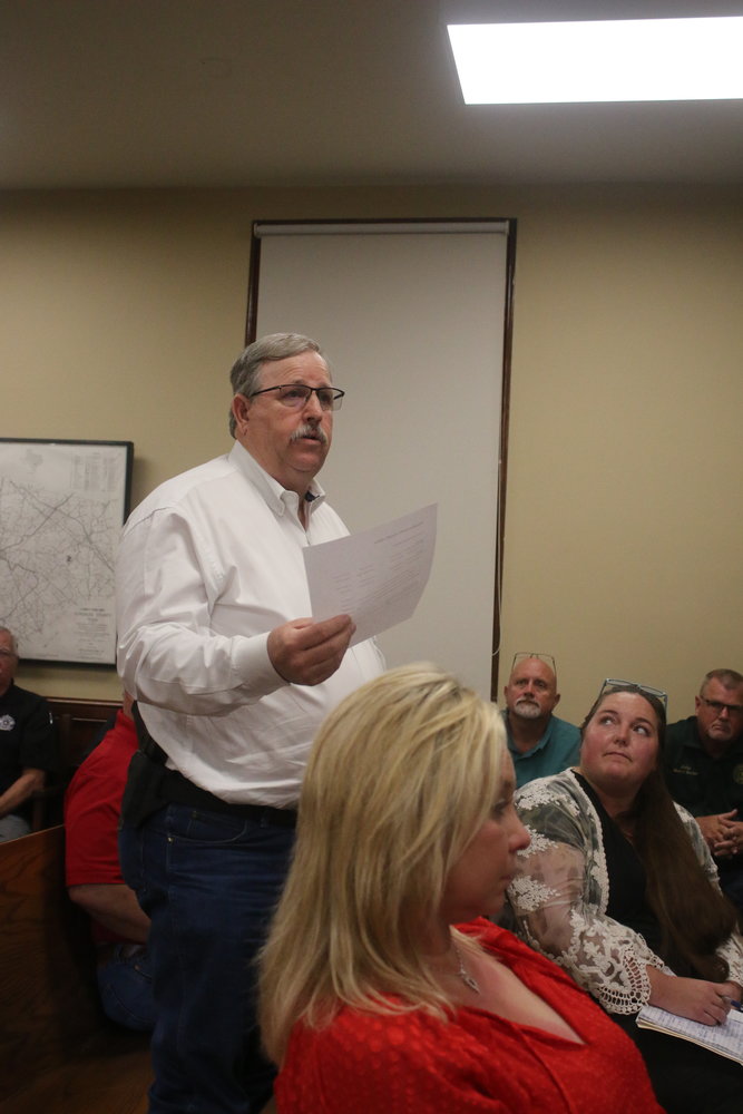 Gonzales County Sheriff Keith Schmidt talks to commissioners about what his department would need.