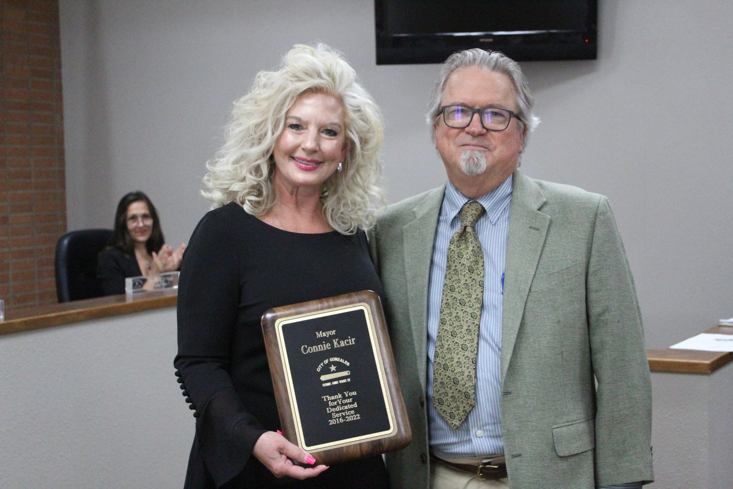New Gonzales mayor, S.H. “Steve” Sucher (Right), with former Mayor Connie Kacir (Left) as she received a plaque honoring six years of services to the city.